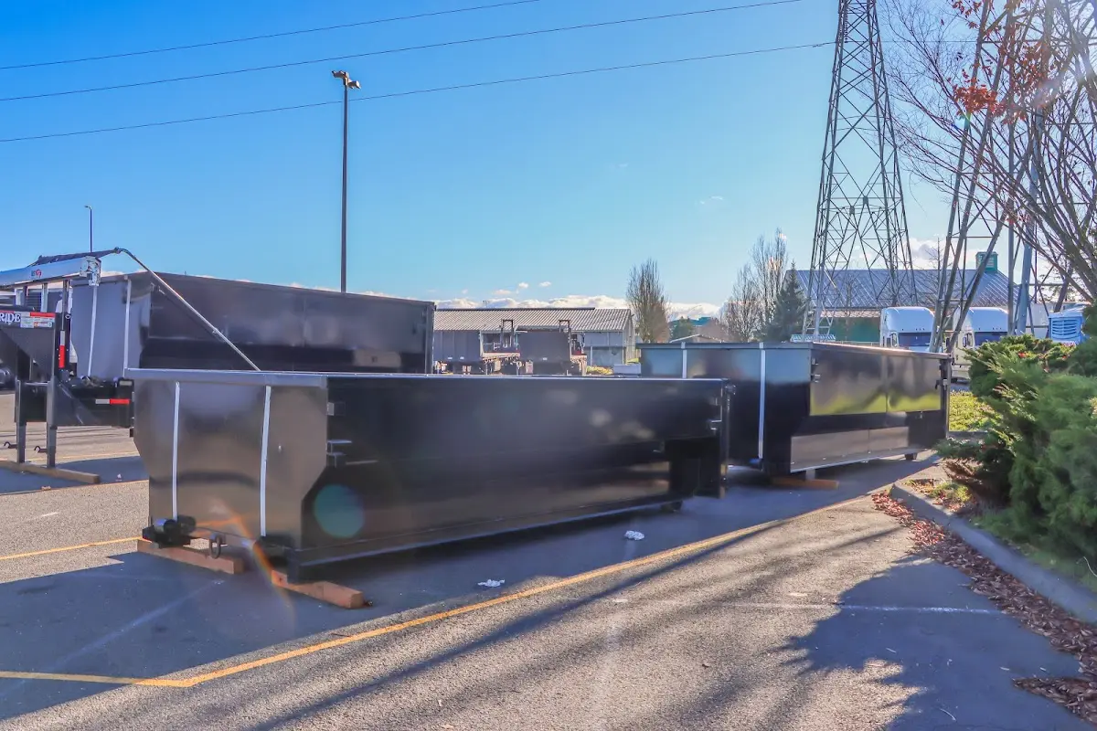 Roll-off dumpster ready for waste disposal at job site for 12 Yard Dumpster Rental in Pacific